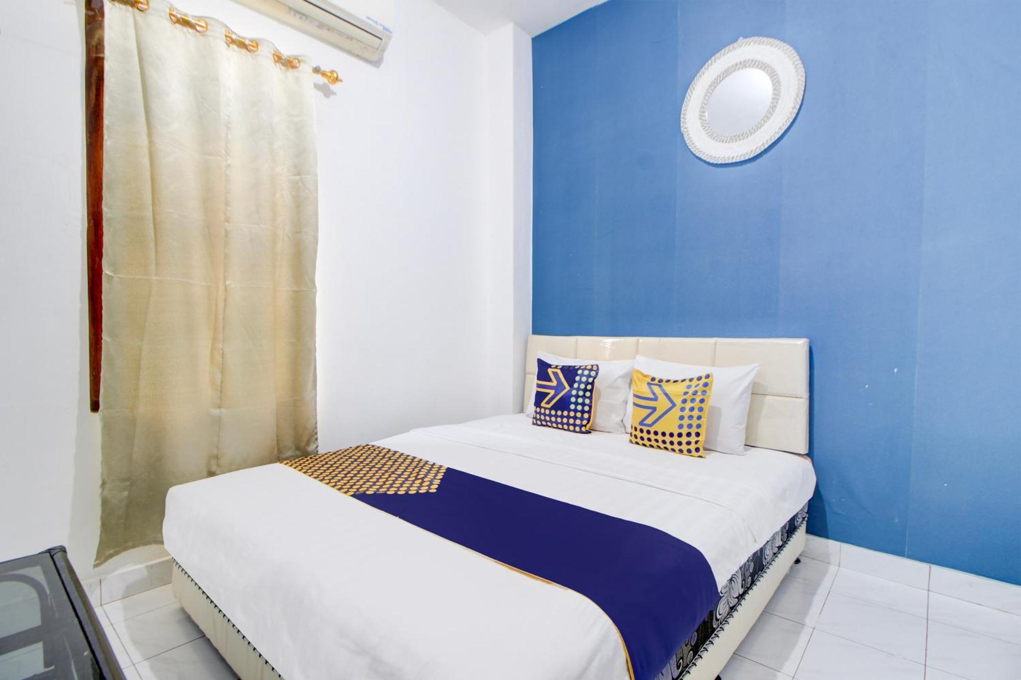 Spot On 94319 Daffsell Syariah Hotel