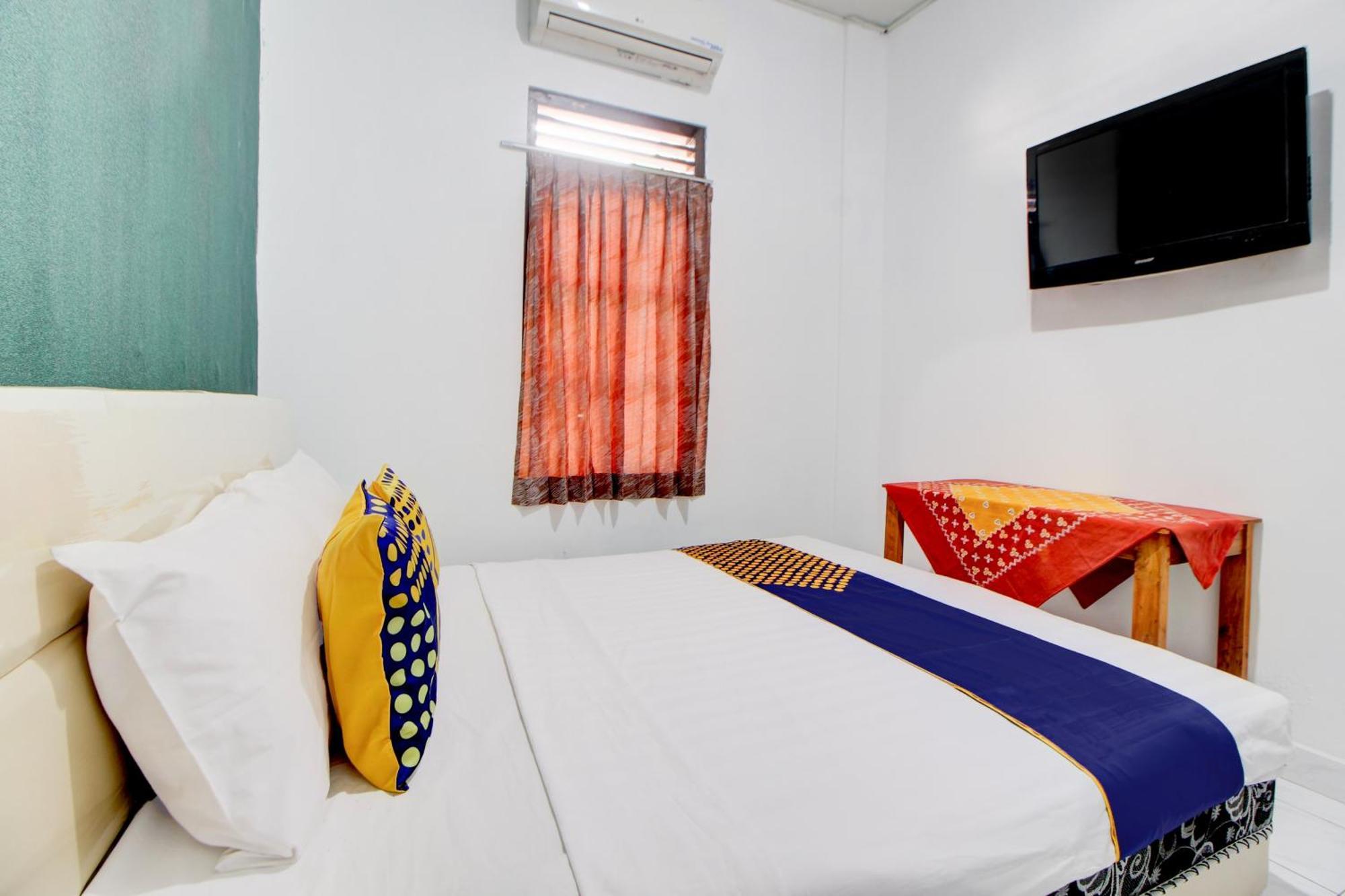 Spot On 94319 Daffsell Syariah Hotel
