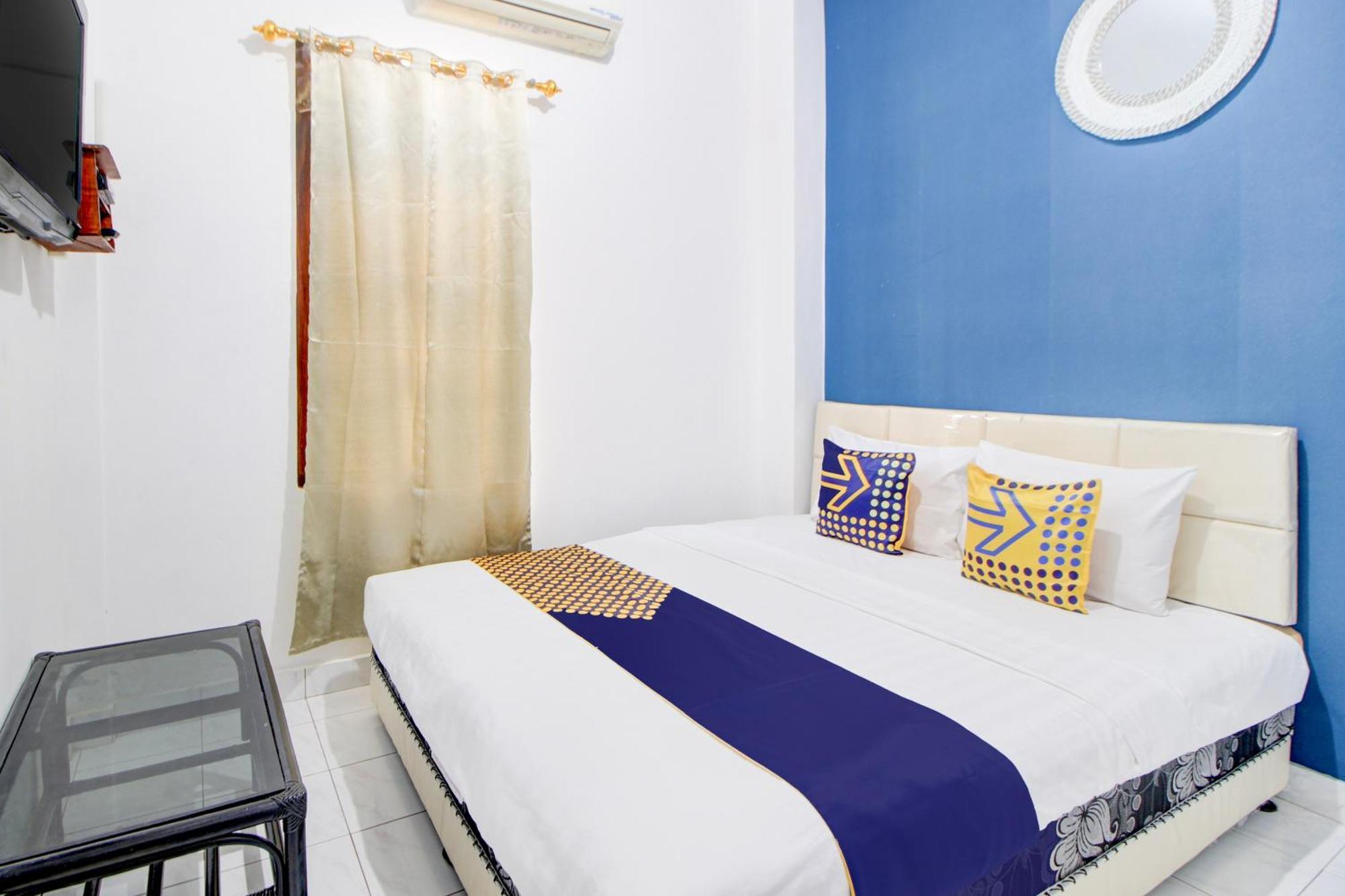 Spot On 94319 Daffsell Syariah Hotel
